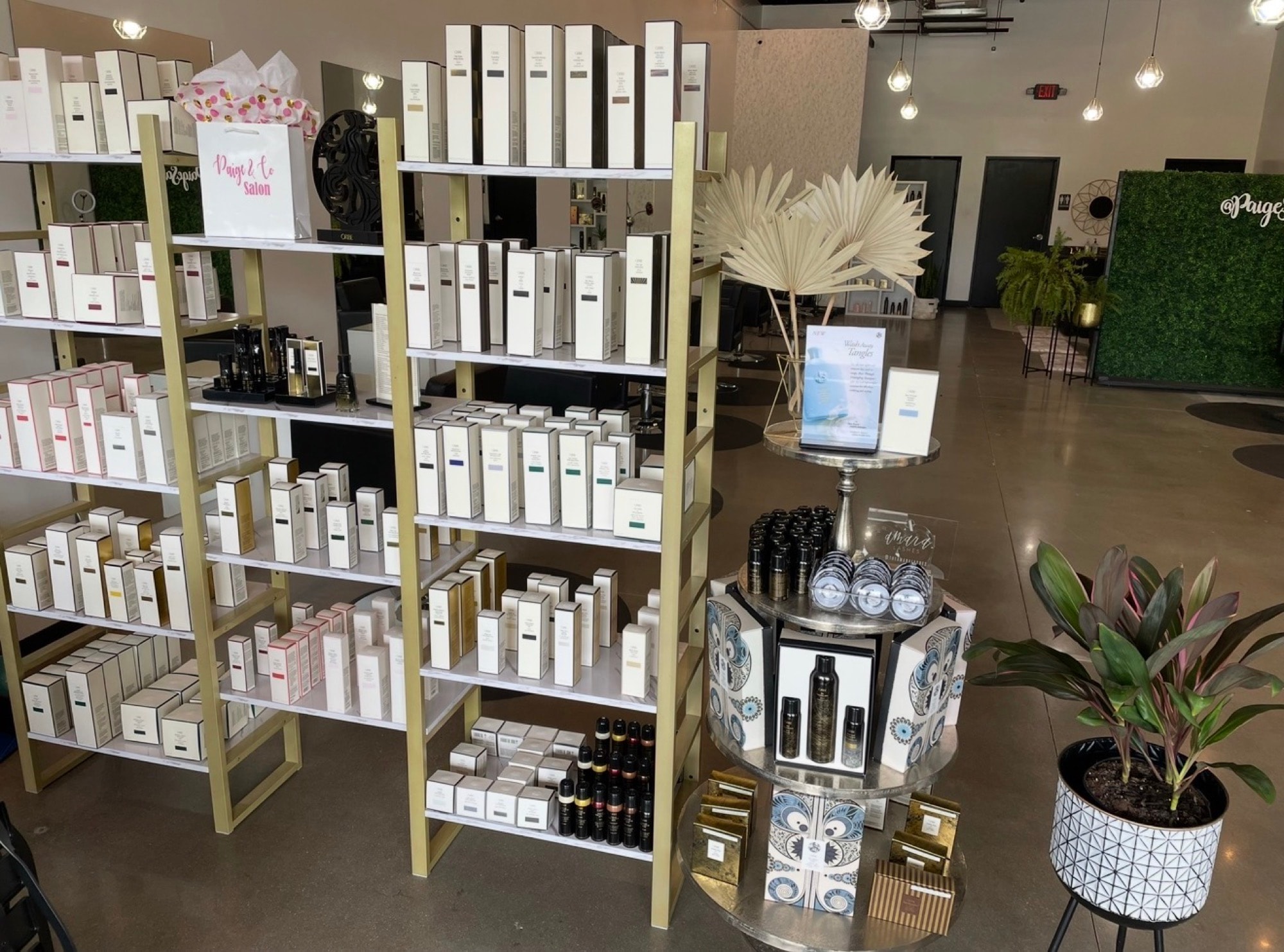 The Paige & Co. Salon — Oribe retail shelves and styling floor
